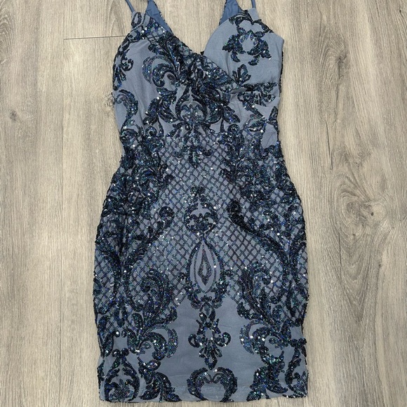 Windsor Blue Bodycon Mini Dress with V-neck Sleeveless Design - Picture 1 of 4